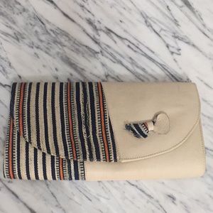 Leather and wool/clothing envelope clutch.